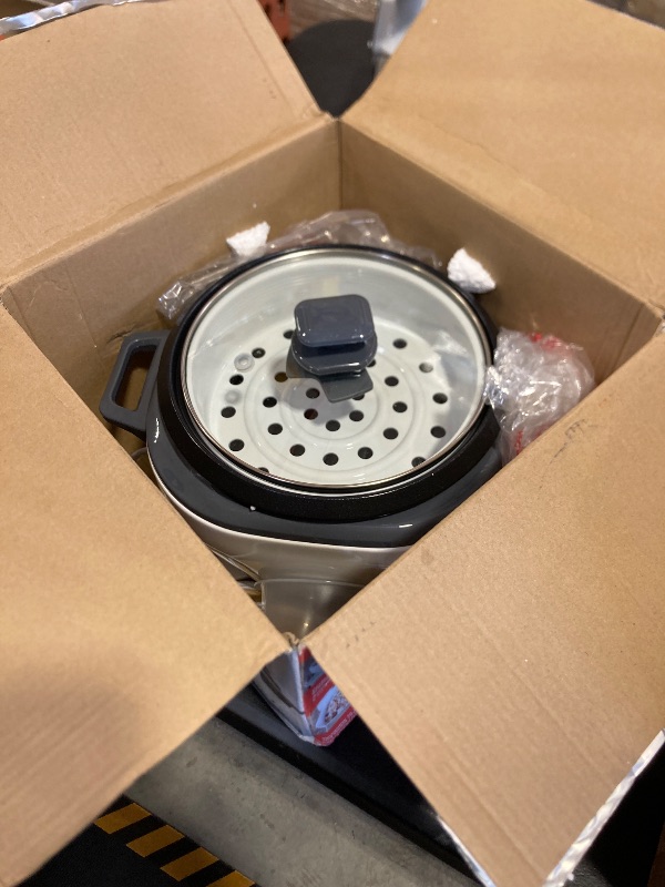 Photo 1 of BLACK+DECKER 6-Cup Rice Cooker, RC506, 3-cup Uncooked Rice, Steaming Basket, Removable Non-Stick Bowl, One Touch