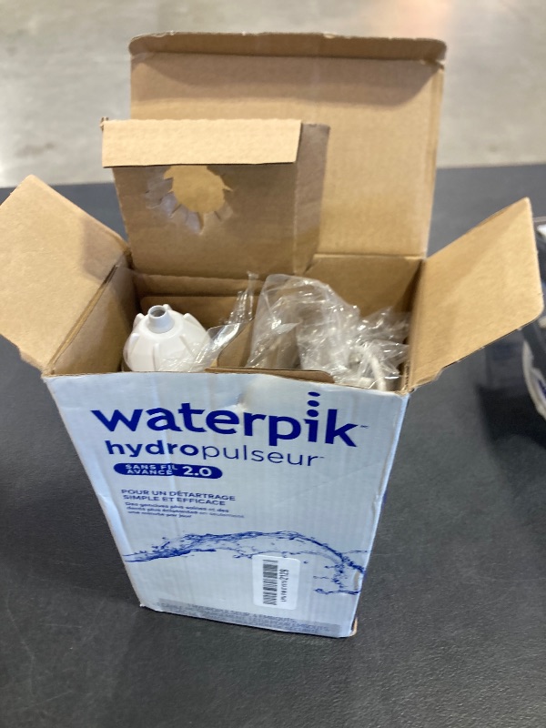 Photo 1 of Waterpik Cordless Advanced 2.0 Water Flosser For Teeth, Gums, Braces, Dental Care With Travel Bag and 4 Tips, ADA Accepted, Rechargeable, Portable, and Waterproof, White WP-580, Packaging May Vary