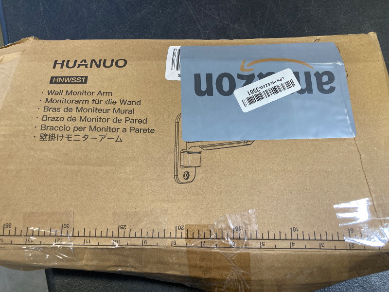 Photo 1 of HUANUO Single Monitor Wall Mount for 13 to 32 Inch Computer Screen, Monitor Wall Mount Arm Holds up to 17.6lbs, Height Adjustable Full Motion Gas Springcore Wall Monitor Mount-VESA Mount 75x75,100x100