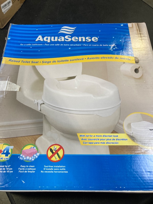 Photo 1 of Drive Medical 770-626 Aqua Sense Raised Toilet Seat with Lid, Standard Seat, White