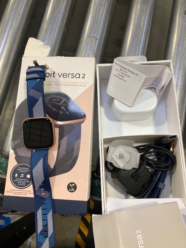Photo 1 of Fitbit Versa 2 Special Edition Health and Fitness Smart Watch with Heart Rate, Music, Alexa Built-In, Sleep and Swim Tracking, Navy and Pink Woven/Copper Rose, One Size (S and L Bands Included), 2.3