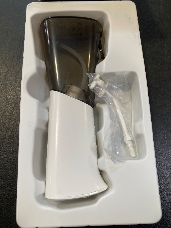 Photo 1 of Ontel Miracle Smile Water Flosser for Teeth & Gum Health, Unique H-Shaped Flossing Head & 4 Water Jets, Cordless Water Flosser Features 360° Cleaning & 3 Pressure Modes, USB Rechargeable Dental Floss