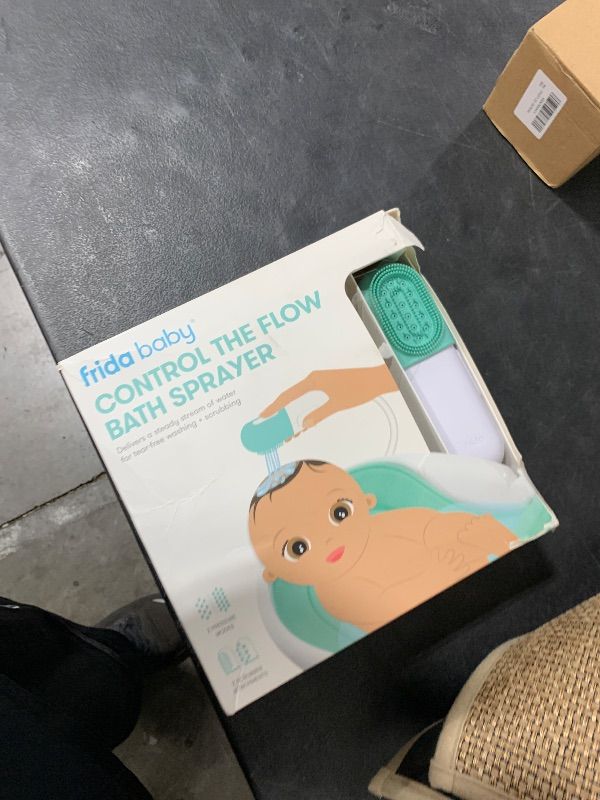 Photo 1 of Frida Baby Control The Flow Bathtub Sprayer Attachment for Baby Bathtub, Shower Head with Scalp Massager, Control Waterflow with 2 Pressure Modes