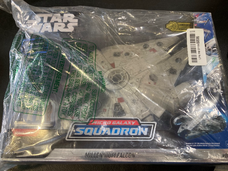 Photo 1 of Star Wars Micro Galaxy Squadron Millennium Falcon - 9-Inch Assault Class Vehicle with Four 1-Inch Micro Figure Accessories
