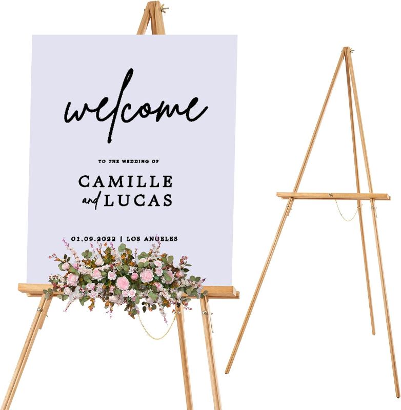 Photo 1 of Falling in Art 65" A-Frame Tripod Easel Stand, Wooden Display Easel with Adjustable Canvas Holder, Floor Easel for Wedding Signs, Posters, Paintings, Artwork(Natural)
