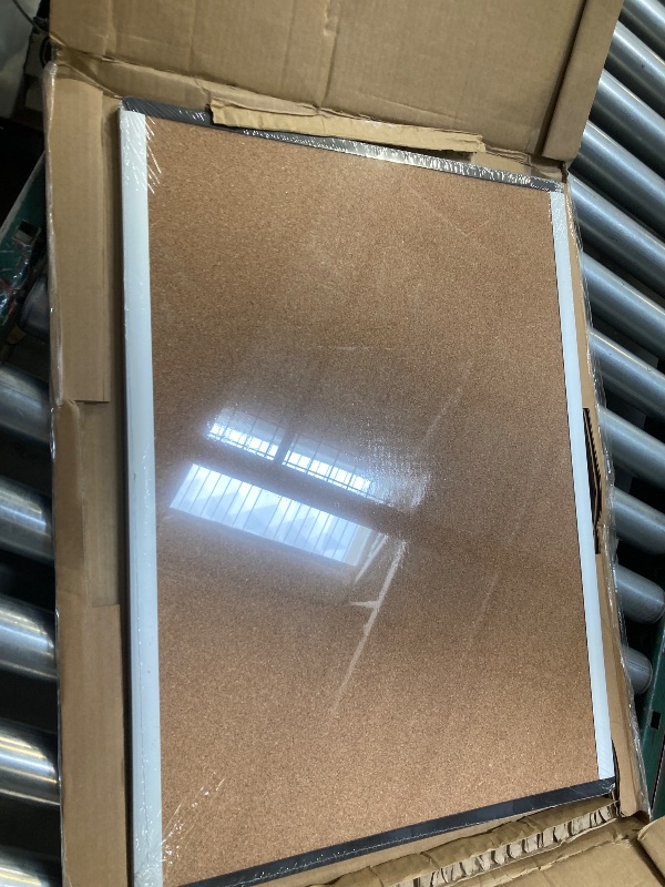 Photo 1 of Amazon Basics Cork BulletinBoard, 23" x 17", Pin Board for Office & Home with Aluminum/Plastic Frame, 1 Pack