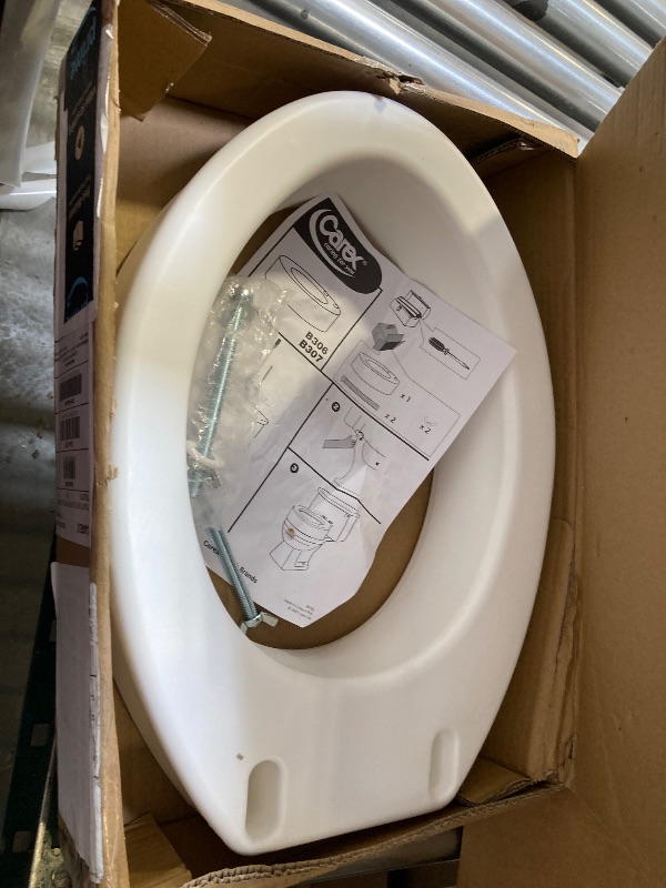 Photo 1 of Carex Toilet Seat Riser, Elongated Raised Toilet Seat Adds 3.5 inches to Toilet Height, for Assistance Bending or Sitting, 300 Pound Weight Capacity Toilet Riser