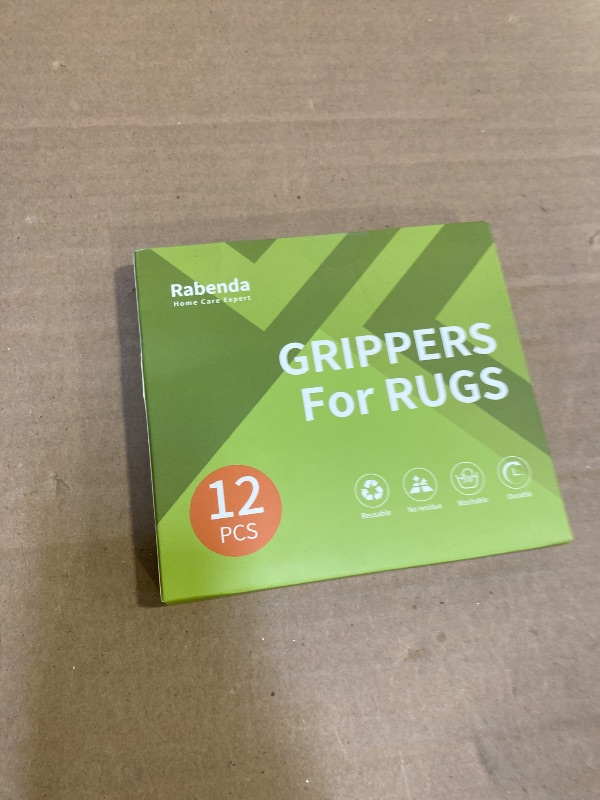 Photo 1 of Rabenda 12 Pcs Rug Tape, Non Slip Rug Pads Grippers for Hardwood Floors and Tiles, Reusable Carpet Tape for Area Rugs, Double-Sided Adhesive Rug Stickers Keep Corners Flat (Black)