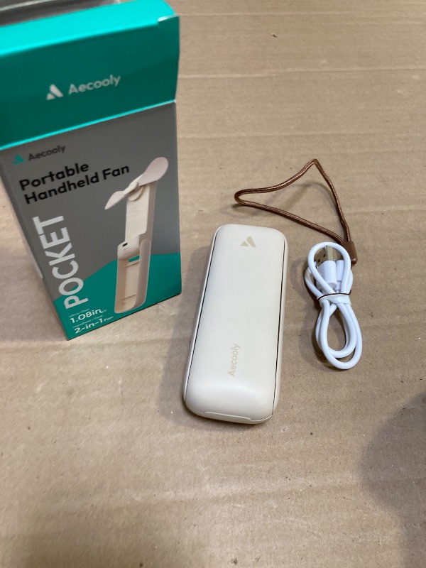 Photo 1 of Aecooly Slim Portable Fan, Thin Handheld Fan, USB Rechargeable Mini Personal [24H Max Cooling Time], Battery Powered Small Foldable Pocket for Travel, Summer, Gifts for Women, Girls -Beige