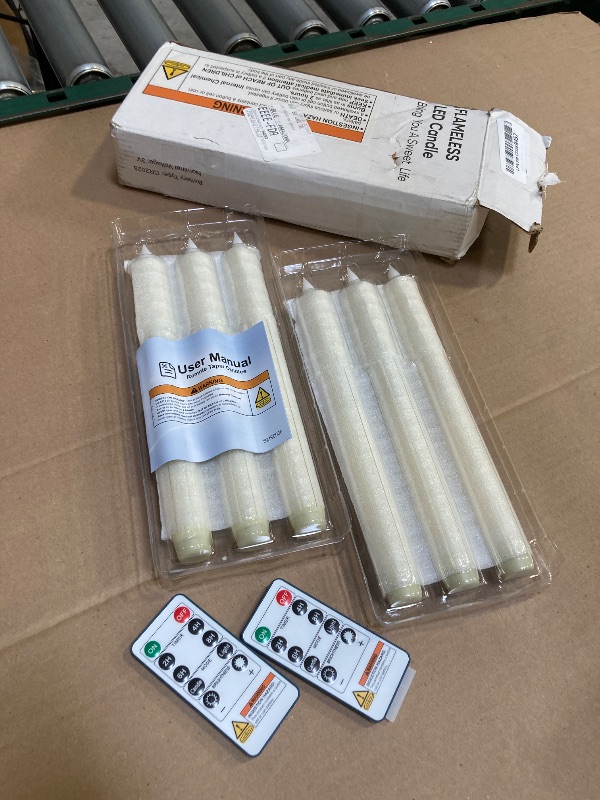 Photo 1 of Homemory Real Wax LED Flameless Taper Candles with Remote Timer, 9.6 Inches Ivory Fake Candlesticks, Dripless Battery Operated Window Candle with 3D Flickering Flame for Fireplace Xmas Halloween