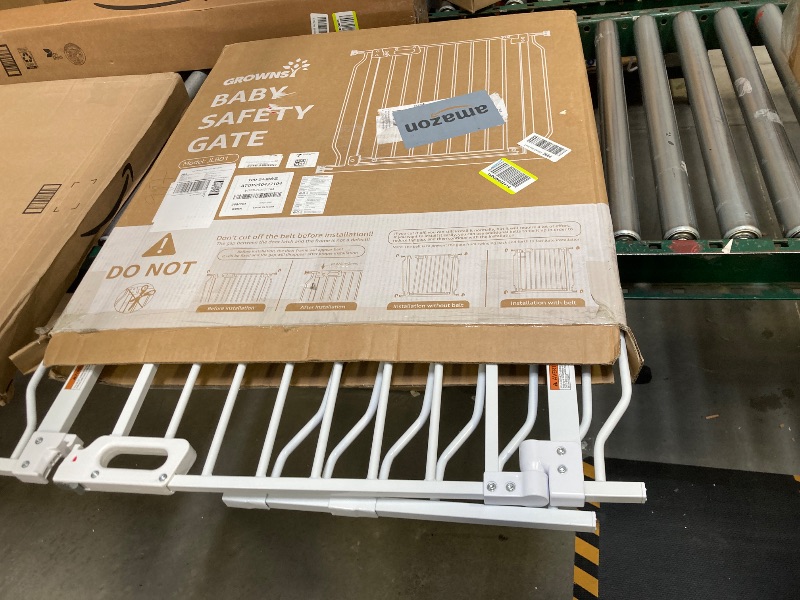 Photo 1 of  Mom's Choice-GROWNSY Baby Gate for Stairs, 29.5"-48.4" Pressure Mounted Baby Gate for Top of Stair&Doorway with V-Shaped Rods, Anti-Trip Pedal, Extra Wide Stairs Dog Gate Easy Install w/Red Reminder 