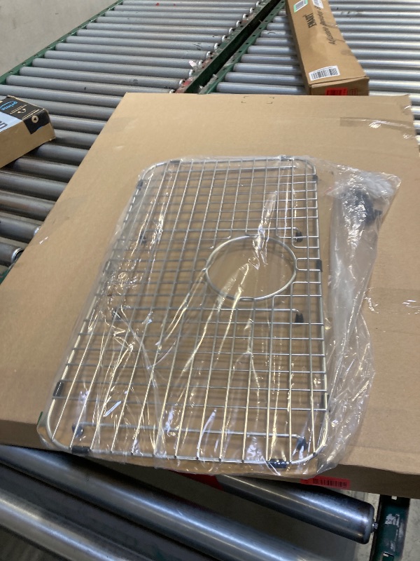 Photo 1 of  Serene Valley Sink Bottom Grid 25-1/8" x 12-7/8", Centered Drain with Corner Radius 1-1/2", Sink Grid Stainless Steel NDG2513C 