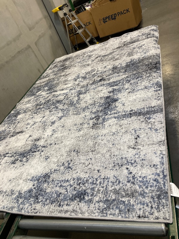 Photo 1 of 8'X5' AREA RUG 