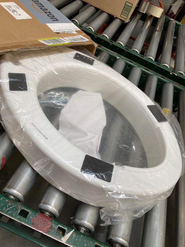 Photo 1 of Carex Toilet Seat Riser, Elongated Raised Toilet Seat Adds 3.5 inches to Toilet Height, for Assistance Bending or Sitting, 300 Pound Weight Capacity Toilet Riser