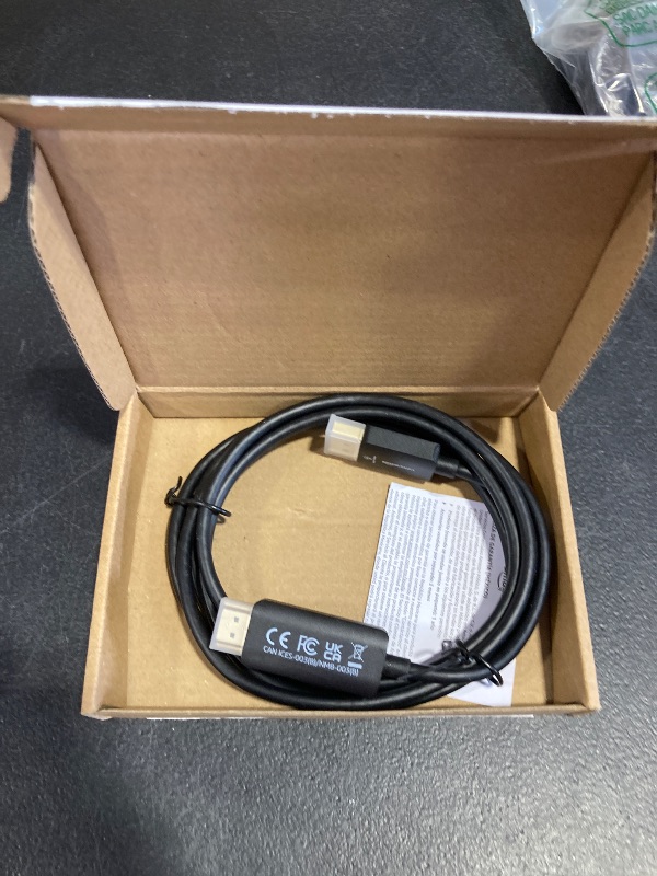 Photo 1 of Amazon Basics DisplayPort to HDMI Cable, Uni-Directional, 1080p, 1920x1200, 4K@60Hz, 6 ft, Gold-Plated Plug, Black