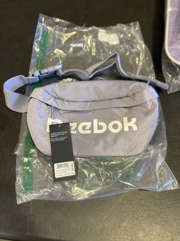 Photo 1 of Reebok Fanny Pack - Lightweight Stylish Crossbody Waist Belt Bags for Women and Men with Adjustable Strap, Size One Size, Verona Violet Haze
