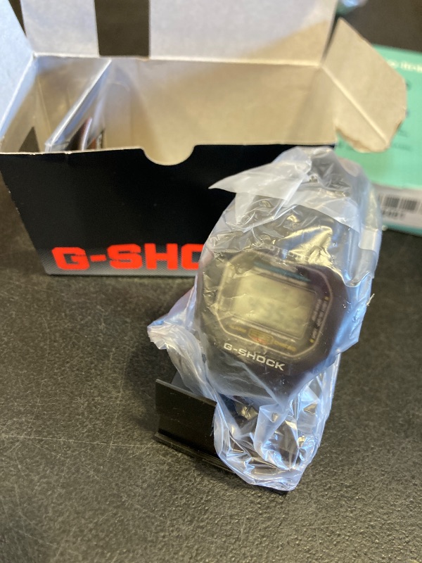 Photo 1 of Casio G-Shock Shock Resistant DW5600UE-1V Men's Water Resistant Black Resin Sport Watch