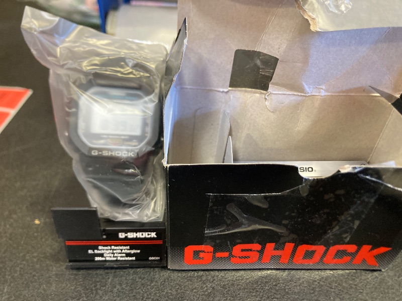 Photo 1 of Casio G-Shock Shock Resistant DW5600UE-1V Men's Water Resistant Black Resin Sport Watch