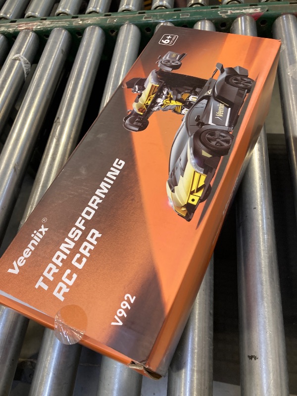 Photo 1 of V992 Transform Remote Control Car, Transform Robot RC Cars, 1:14 Scale, 2-in-1 Robot Toy Car with Sound & Light, Gesture Sensing, Automatic Deformation, Great Gift Toys for Boys and Girls 4-6 (Golden)