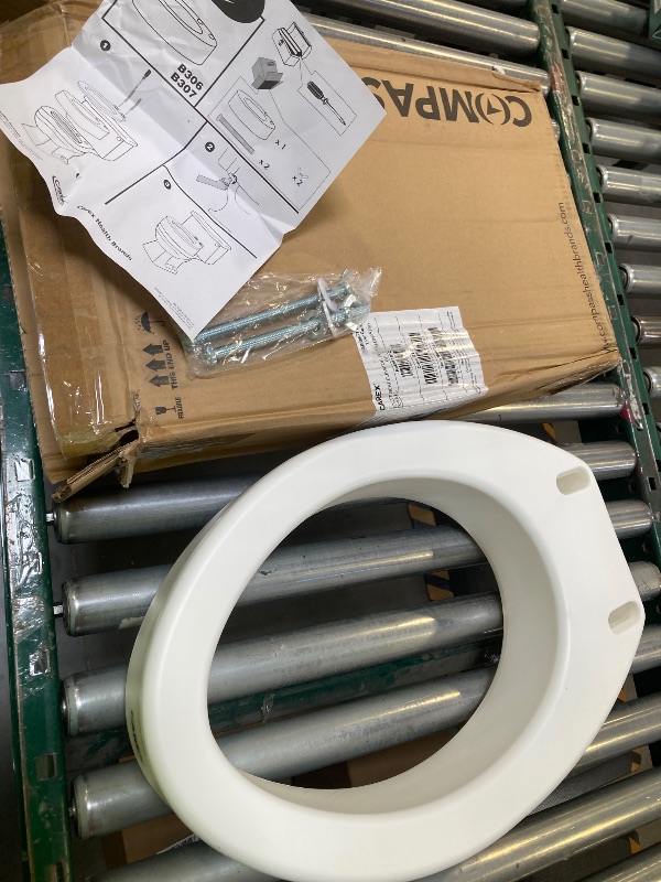 Photo 1 of Carex Toilet Seat Riser, Elongated Raised Toilet Seat Adds 3.5 inches to Toilet Height, for Assistance Bending or Sitting, 300 Pound Weight Capacity Toilet Riser