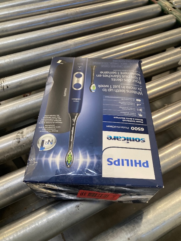Photo 1 of Philips Sonicare ProtectiveClean 6500 Rechargeable Electric Toothbrush, with Pressure Sensor, 3 Cleaning Modes, SmarTimer and QuadPacer, 14-Day Battery Life, Charging Travel Case, Navy Blue, HX6462/07