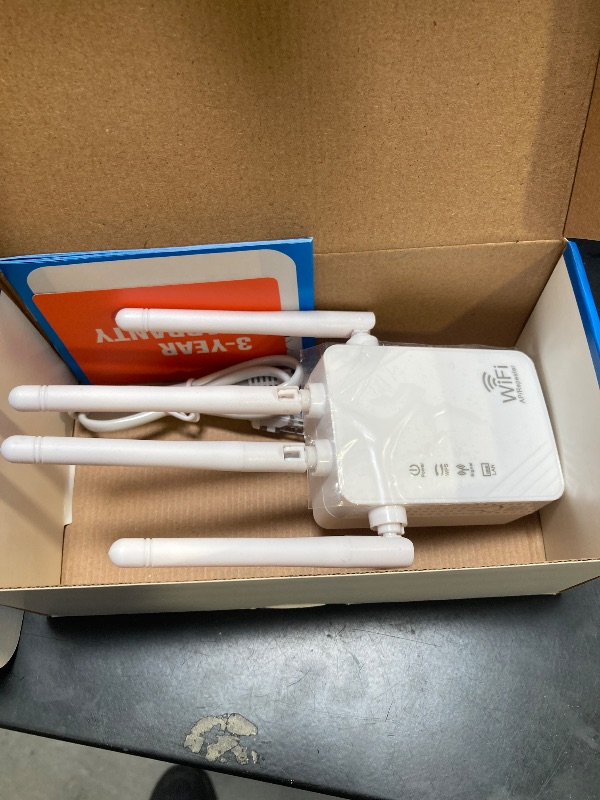 Photo 1 of WiFi Extender Signal Booster Up to 10000sq.ft and 55 Devices, WiFi Range Extender, Wireless Internet Repeater, Long Range Amplifier with Ethernet Port, 1-Key Setup, Access Point, Alexa Compatible