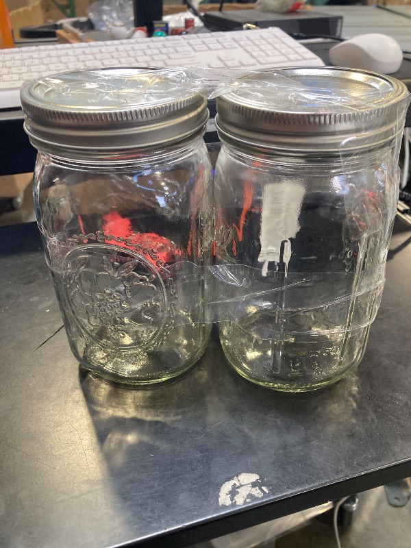 Photo 1 of Ball Wide Mouth Glass Mason Jars with Lids and Bands, Used for Canning, Pickling, Juice, Jam, Jelly, Quart Size 32 Ounce (Pack of 2)