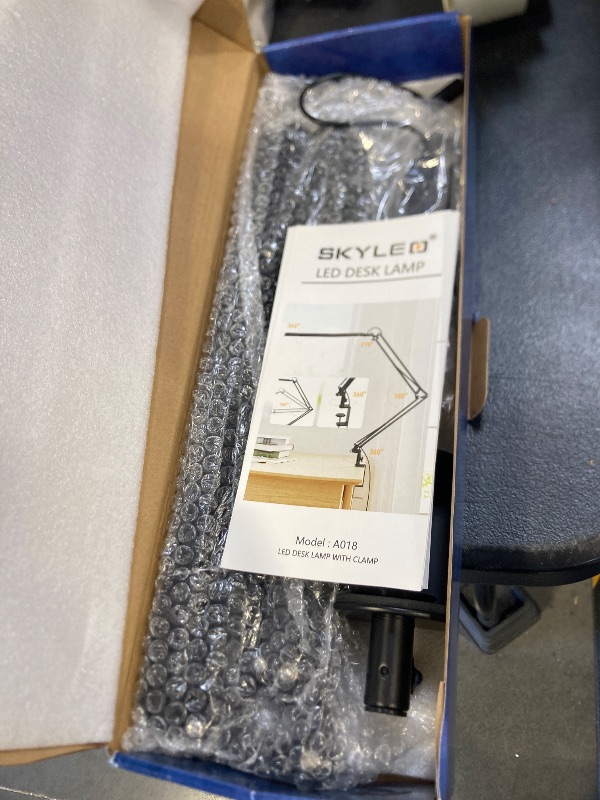 Photo 1 of SKYLEO Led Desk Lamp - Desk Light for 31.5" Tall - 5 Color Modes X 11 Brightness Levels - Adjustable Swing Arm - Timmer & Memory Function - 12W Lamp for Desk - Black