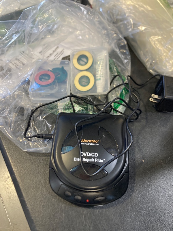 Photo 1 of Aleratec Motorized DVD CD Cleaner Disc Repair System - Scratch Remover and Cleaner for CD Player Discs - Includes Solution - Portable Disc Cleaner for Restoring CDs, DVDs, and More
