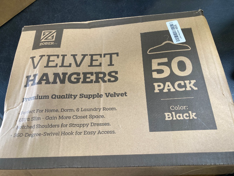 Photo 1 of Zober Velvet Hangers 50 Pack - Black for Coats, Pants & Dress Clothes - Non Slip w/ 360 Degree Swivel, Holds up to 10 lbs - Strong Felt Hangers for Clothing