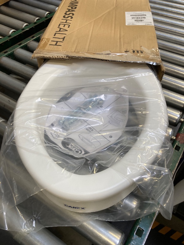 Photo 1 of Carex Toilet Seat Riser, Elongated Raised Toilet Seat Adds 3.5 inches to Toilet Height, for Assistance Bending or Sitting, 300 Pound Weight Capacity Toilet Riser