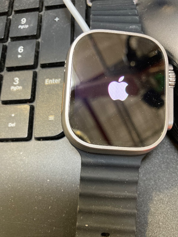 Photo 1 of Apple Watch Ultra [GPS + Cellular 49mm] Titanium Case with Midnight Ocean Band, One Size (Renewed Premium)
