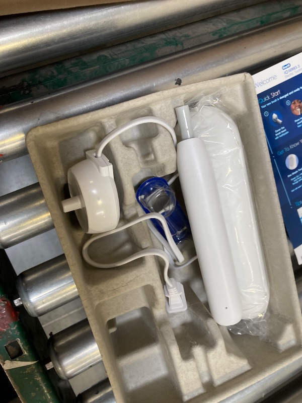 Photo 1 of Oral-B iO Simple Clean Rechargeable Electric Powered Toothbrush, Pure White with 1 Gentle Care Brush Head and 1 White Travel Case - Automatic Pressure Sensor to Protect Gums - 3 Modes -2 Min Timer