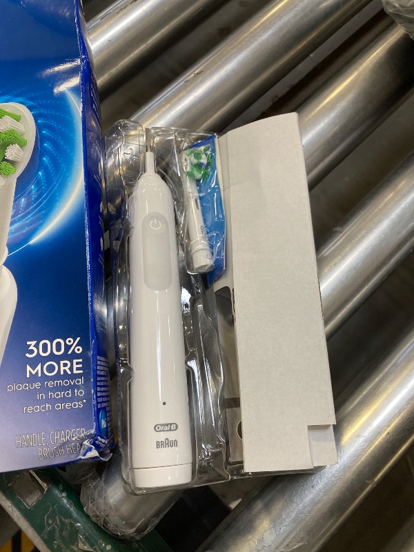 Photo 1 of Oral-B Pro 1000 Rechargeable Electric Toothbrush, White
