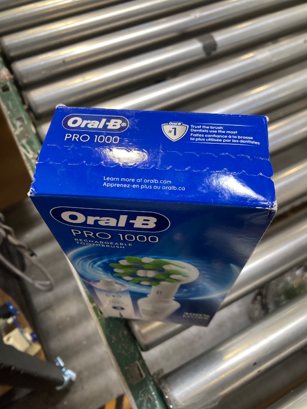 Photo 1 of Oral-B Pro 1000 Rechargeable Electric Toothbrush, White