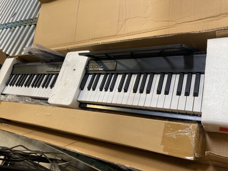 Photo 1 of 88 Key Piano Keyboard,Beginner Electric Digital Piano with Semi Weighted Keys,Keyboard Piano withSustain Pedal, Power Supply, Stand, Carrying Case,Headphones
