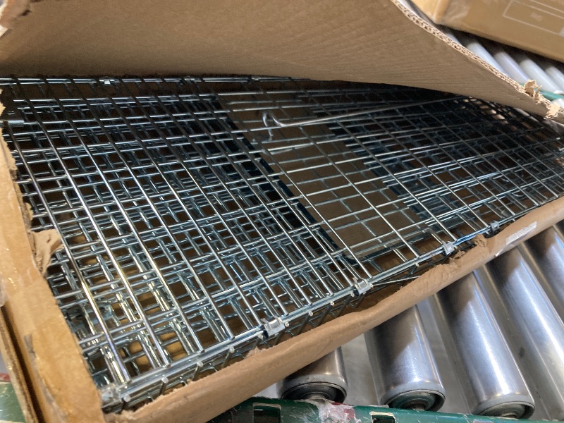 Photo 1 of Animal Trap 26"x10"x9" Cage Trap,Heavy Duty Folding Raccoon Traps Live Animal Cage Trap,Humane Catch and Release Stray Cats,Squirrels,Rabbits