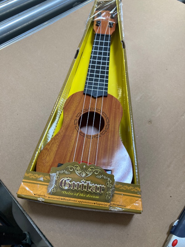 Photo 1 of Raimy 17in Kids Ukulele Guitar - 4 Strings Mini Guitar Children Musical Instruments Educational Toys with Picks for Toddler Kids Boys Girls Beginner (Burlywood)