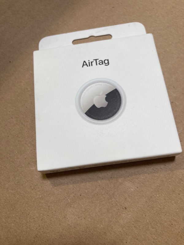 Photo 1 of Apple AirTag. Keep Track of and find Your Keys, Wallet, Luggage, Backpack, and More. Simple one-tap Set up with iPhone or iPad