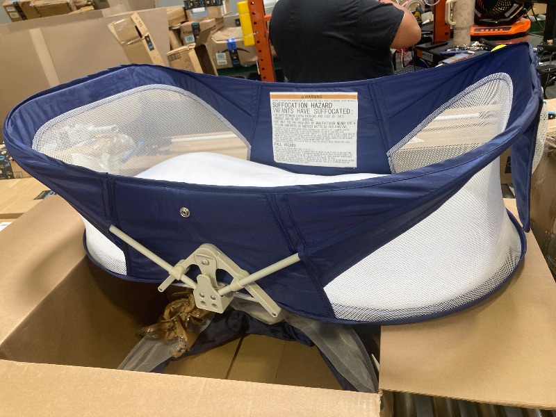 Photo 1 of Ultra-Compact Travel Bassinet