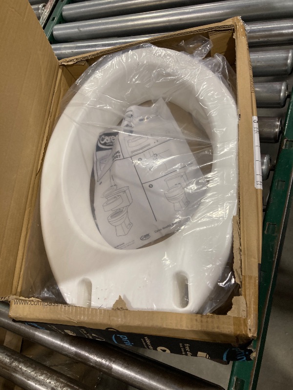 Photo 1 of Carex Toilet Seat Riser, Elongated Raised Toilet Seat Adds 3.5 inches to Toilet Height, for Assistance Bending or Sitting, 300 Pound Weight Capacity Toilet Riser