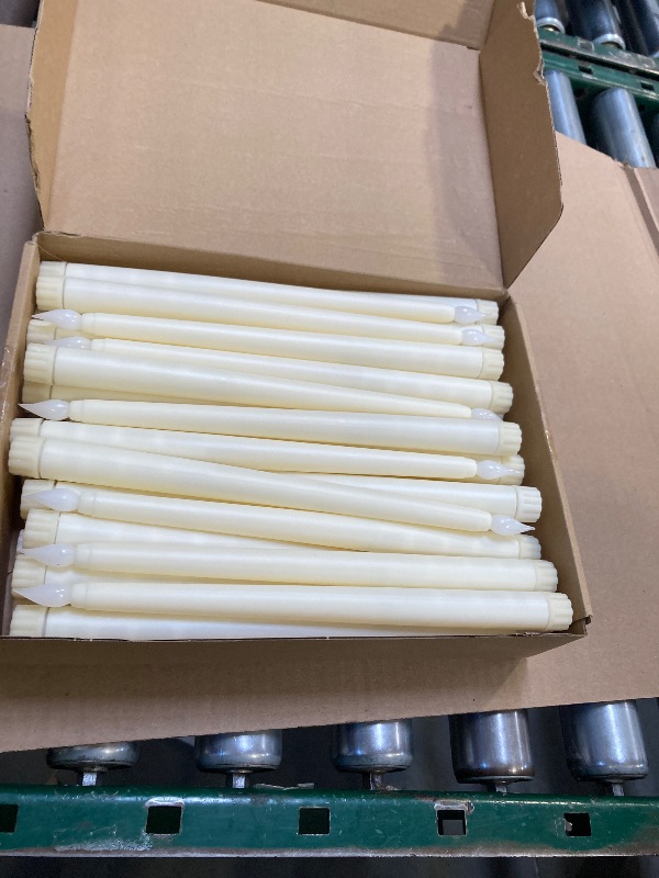 Photo 1 of Funtery 48 Pcs Flameless LED Taper Candles 11 Inch Battery Operated Flickering Candles Bulk for Christmas Church Wedding Party (Ivory,Classic Style)