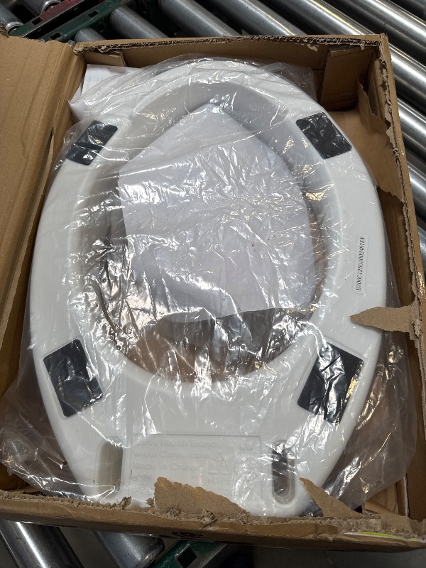 Photo 1 of Carex Toilet Seat Riser, Elongated Raised Toilet Seat Adds 3.5 inches to Toilet Height, for Assistance Bending or Sitting, 300 Pound Weight Capacity Toilet Riser