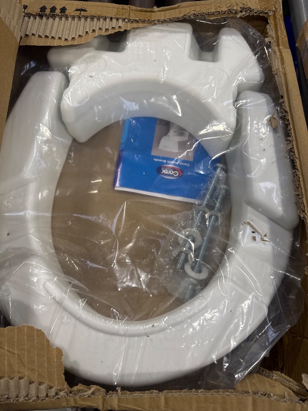 Photo 1 of Carex Elongated Hinged Toilet Seat Riser, Adds 3.5 Inches of Height to Toilet, 300 Pound Weight Capacity, Raised Toilet Seat