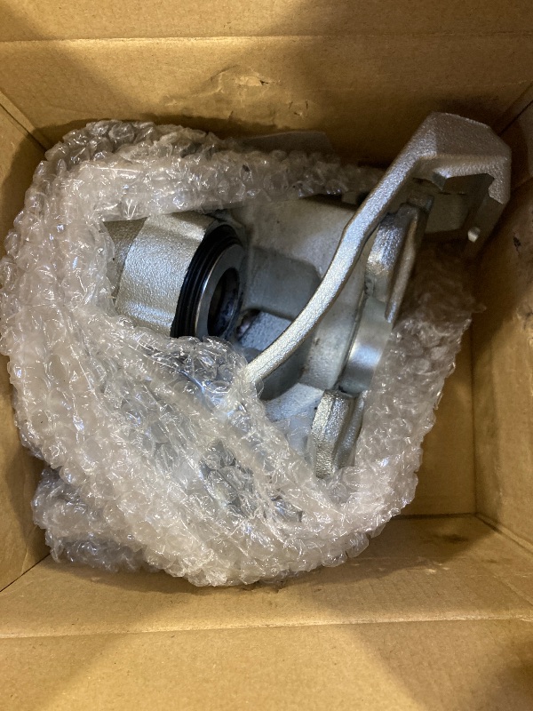Photo 1 of GM Parts 172-2734 Rear Driver Side Disc Brake Caliper Assembly