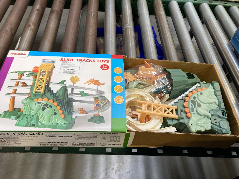 Photo 1 of JUKUDAHU Dinosaur Climbing Slide Stair Toy for Toddlers Aged 3 4 5 6 7 8 - Racing Track Game Set, Sliding Car Toy, Dinosaur Themed with Light and Music, Birthday Dinosaur Gifts for Boys Girls Kids