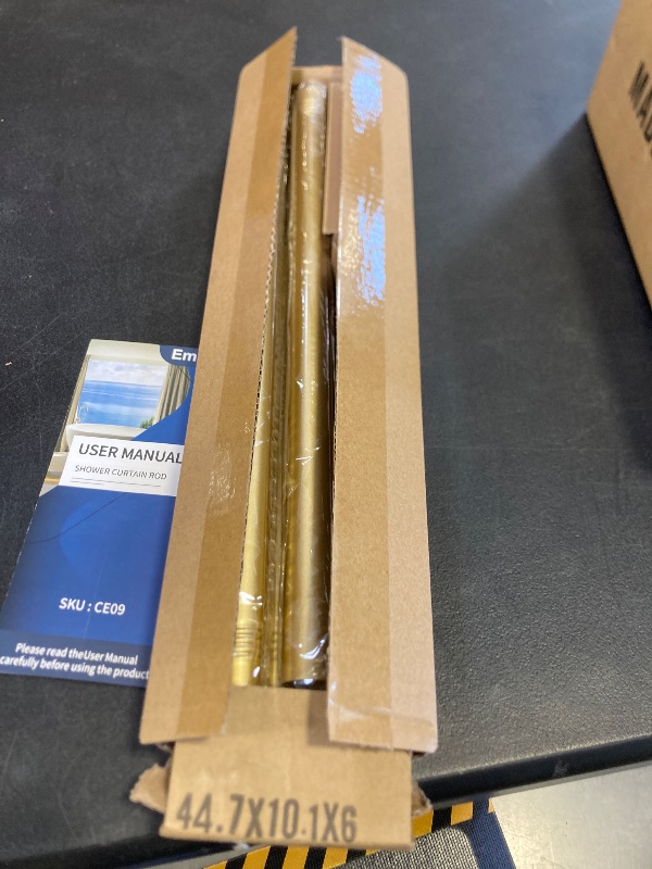 Photo 1 of Emlaoe Gold Shower Curtain Rod 34-82 Inches(2.8-6.8ft) Never Rust Adjustable Shower Rod Spring Tension Non Slip No Drilling Shower Rods for Bathroom Garland Window