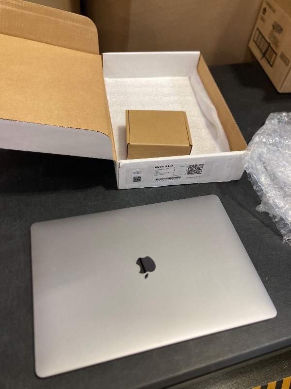Photo 1 of Apple 2019 MacBook Pro with 2.3GHz Intel Core i9, 16-inch, 16GB RAM, 1TB Storage, Space Gray (Renewed)