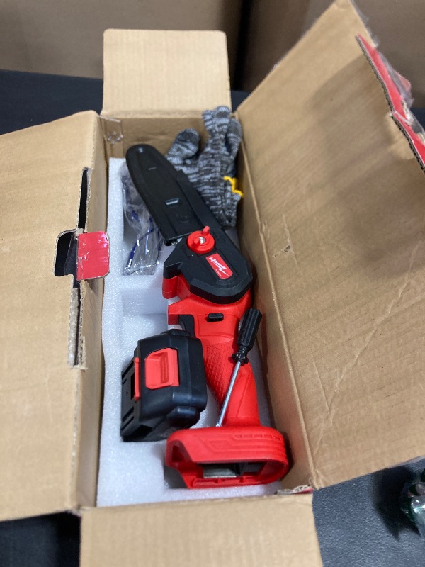 Photo 1 of Cordless Mini Chainsaw, 20V Max Battery 6 Inch Small Chain Saw, One-Hand Handheld Electric Portable Chainsaw for Cutting Wood Trimming and Woodworking- Mini Chain Saw Cordless with 1 Batter