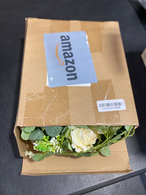 Photo 1 of Riceshoot 4 Pack 26 ft Artificial Eucalyptus Vines Garland with Flowers Fake Floral Flower Garland Rose Wreath for Wedding Party Arch Table Decor Backdrop Decorations(Champagne)